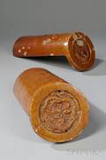 Two Carved Ceramic Roof Ends