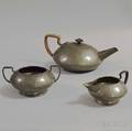 Tudric Pattern Pewter Threepiece Tea Service