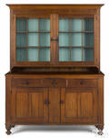 Pennsylvania walnut twopart Dutch cupboard ca 1830