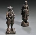 Two Carved Walnut Peasant Figures