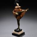 After Roland Paris Austrian 18941915 Art Deco Coldpainted Bronze and Ivory Figure of a Pierrot Playing the Mandolin