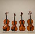 Four Violins Two Oneeighth and Two Onetenth Size