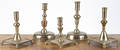 Two bell based brass candlesticks