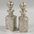 Pair of Silver Overlay Cologne Bottles