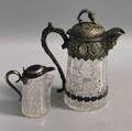 Two Colorless Cut Glass Pitchers with Silverplated Mountings
