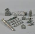 Twelve Assorted Silver and Silvermounted Perfumes