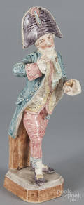 Figural porcelain figure of a gentleman taking snuff