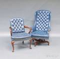 Two Tufted Leather Upholstered Armchairs