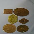 Six Brass Signs and Plaques