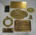 Seven Brass Plaques
