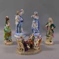 Four German Porcelain Figures and a Figural Group