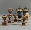 Eight Mostly Vienna Porcelain Covered Urns