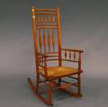William White Maple Arrowback Windsor Armed Rocker and a Southwest Caucasian Rug