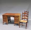 DotenDuton Mahogany Kneehole Desk and a Pair of Stained Maple Ladderback Chairs