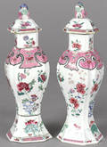 Chinese Qianlong period pair of famille rose covered garniture vases