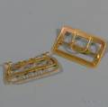 Two Gold Buckles