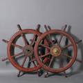 Pair of Mahogany and Cast Iron Ships Wheels