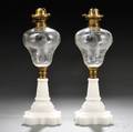 Pair of Colorless and Pressed Milk Glass Kerosene Lamps with Eagle Design