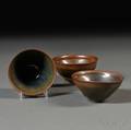 Three Northern Blackware Tea Bowls with Indented Lips