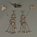Four Silver Accessories and a Bronze Dog