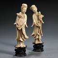 Pair of Faux Ivory Figures of Women on Wood Stands