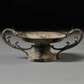 Footed Bronze Candle Holder