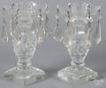 Pair of colorless glass candleholders