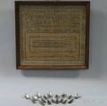 Mary Buckleys Needlework Sampler and Nine Coin Silver Teaspoons