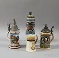 Three Metalmounted Military Steins and a Mug
