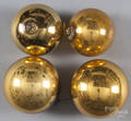 Four yellow kugel ornaments