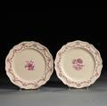Two Creamcolored Earthenware Husk Pattern Service Plates