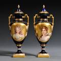 Pair of Vienna Porcelain Portrait Vases and Covers