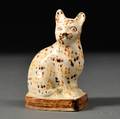 Staffordshire Creamcolored Earthenware Model of a Speckled Cat