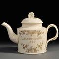 Staffordshire Creamcolored Earthenware Teapot and Cover