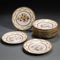 Eleven Handpainted Limoges Porcelain Plates Depicting Orchids