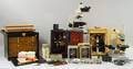 Four Modern Microscopes and Accessories