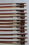 Twelve Nickelmounted Violin Bows