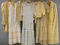 Seven Creamcolored Antique Clothing Items