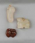 Three Carved Hardstone Pendants