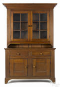 Pennsylvania walnut twopart Dutch cupboard mid 19th c