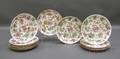 Twelve Famille Rose Decorated Porcelain Dinner Plates