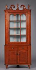 Redstained and Carved Glazed Cherry Twopart Corner Cupboard