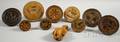 Nine Folk Carved and Turned Wood Butter Stamps and a Pastry Wheel