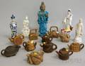 Eleven Asian Ceramic Teapots and Five Figures