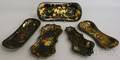 Five Small Victorian Gilt and Polychromedecorated Black Lacquered Papiermache Trays