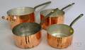Set of Four Graduated Copper Pots