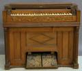 New Haven Melodeon Co Carved Walnut Pump Organ