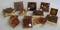 Thirtyseven Assorted Brownglazed Molded Art Pottery Tiles