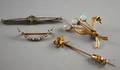 Four Gold Gemset Pins