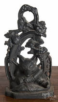 Cast iron fox hunt doorstop